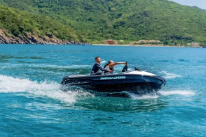 Visitors enjoying water sports during a yacht tour