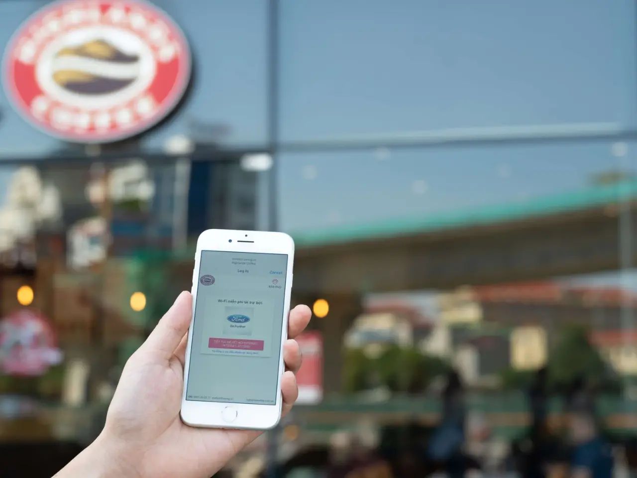 Travelers easily finding free public WiFi at cafés such as Highlands Coffee in Nha Trang.