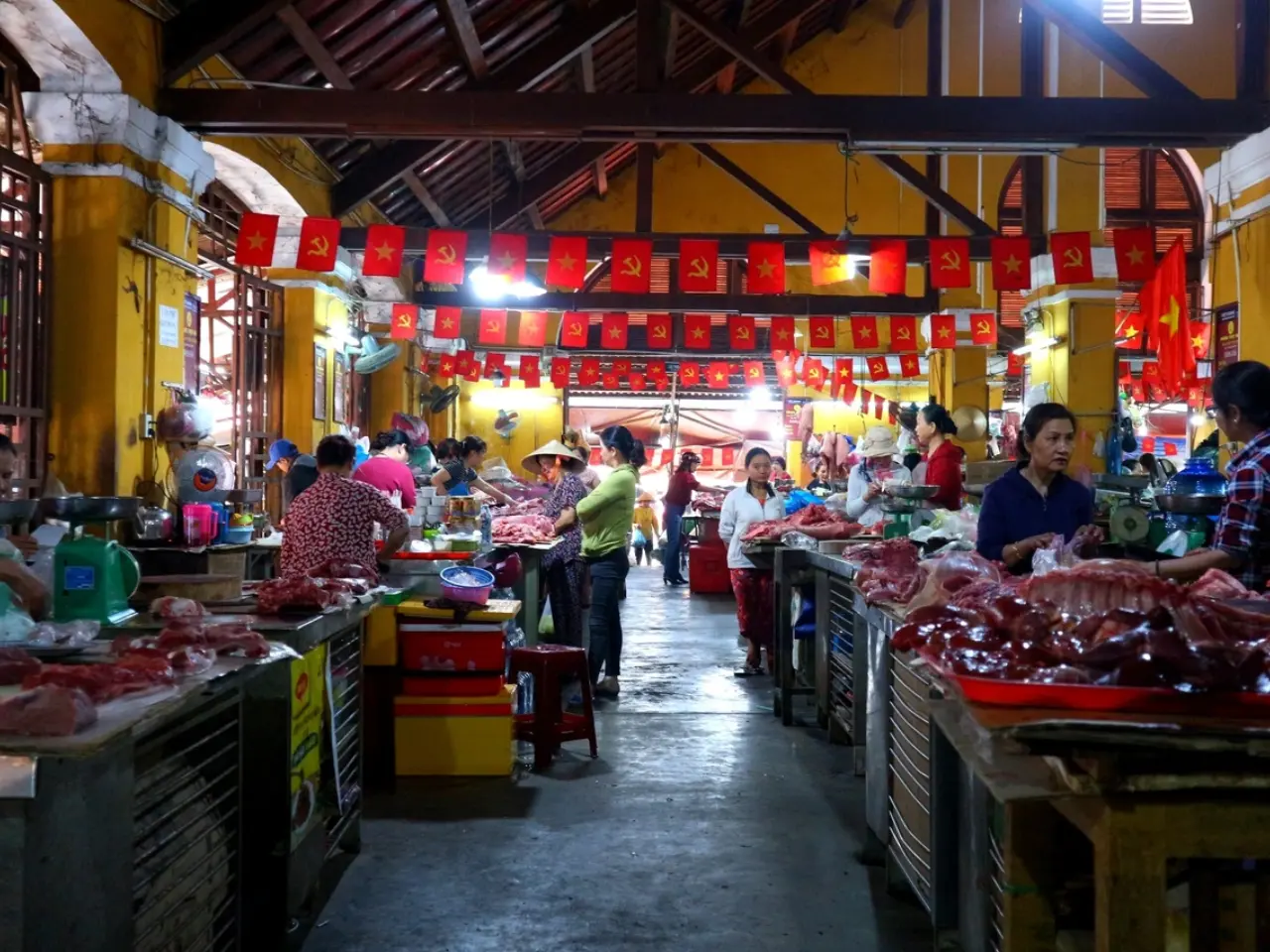 Butcher counter with fresh pork and beef at Vinh Hai Market