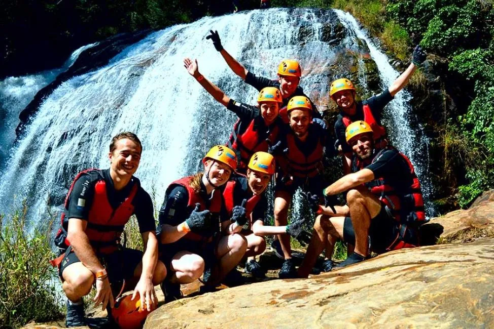 Group Experience at Da Lat Canyoning Tour A group of travelers wearing safety gear after completing a canyoning adventure in Da Lat